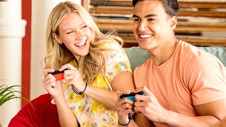 Actual product image Nintendo Switch Console - Neon Red/Neon Blue (UK) (Switch)