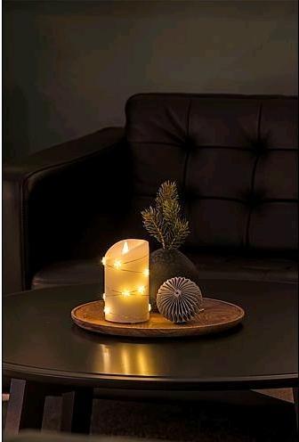 Actual product image Konstsmide LED real wax candle cream white with star wire