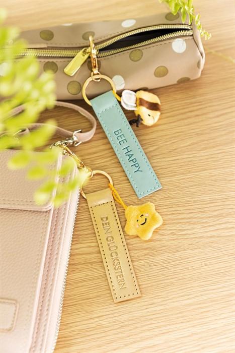 Actual product image Magni NICI Schlüsselanhänger Dein Glücksstern Kunstlederband mit Stern gold 10cm