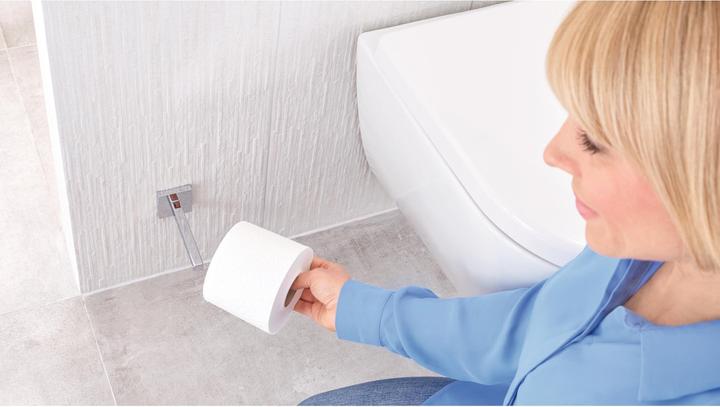 Actual product image tesa DELUXXE WC replacement roll holder incl. adhesive solution without drilling