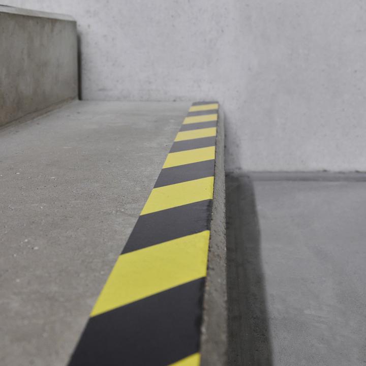 Actual product image Defender EXA-TAPE® BY 50 BULK - Premium fabric adhesive tape BULK | black/yellow | glossy | 50 mm x 50 m (50 mm)