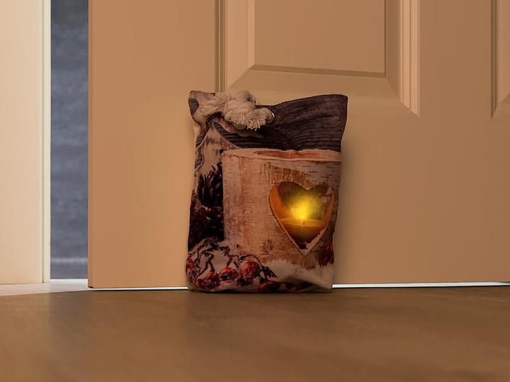 Image du produit Infactory Coussin cale-porte avec motif de bougie à chauffe-plat (20 x 14 x 6 cm)