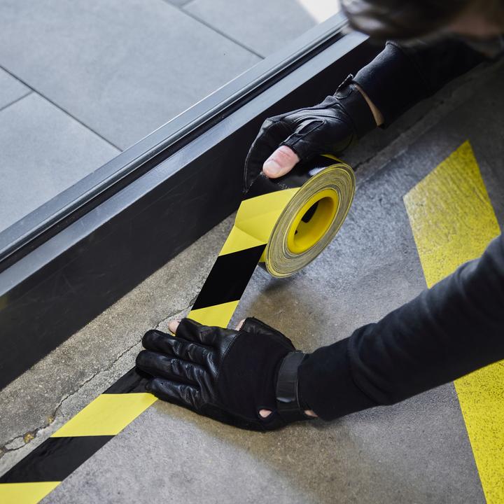 Actual product image Defender EXA-TAPE® BY 50 BULK - Premium fabric adhesive tape BULK | black/yellow | glossy | 50 mm x 50 m (50 mm)