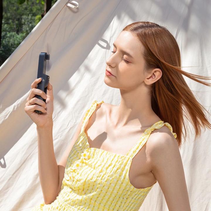 Actual product image Jisulife Handheld Fan Life8 Mini Portable USB Fan with Power Bank Function 2000mAh and Flashlight -