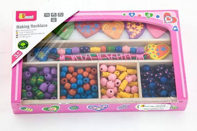 Immagine prodotto New Classic Toys SP VIG Set di gioielli in perline di legno