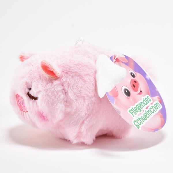 Produktbild Kögler Fliegendes Schweinchen, mit Vibration und drehendem Schwanz in 3 Designs sortiert (6 cm)