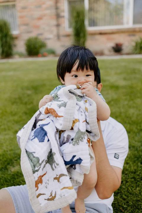 Actual product image little unicorn Cotton Muslin Baby Blanket - Dino Friends (120 x 120 cm)