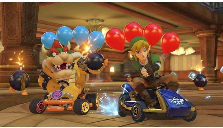 Immagine prodotto Nintendo Switch modello OLED (bianco) - Mario Kart 8 Deluxe + abbonamento a Switch Online (12 mesi)