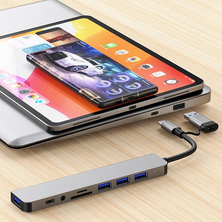 Immagine prodotto Deltalabs Hub multiporta USB C/USB 3.0 con SD/MicroSD e jack da 3,5 mm - 5 Gbit/s (USB C + 4x USB A) (USB-A, USB-C, 4 porte)
