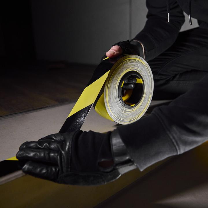 Image du produit Defender EXA-TAPE® BY 50 ERGO-CORE - Ruban adhésif tissé premium avec ERGO-Core | noir/jaune | brillant | 50 (50 mm)