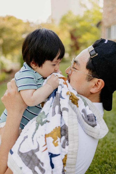 Actual product image little unicorn Cotton Muslin Baby Blanket - Dino Friends (120 x 120 cm)