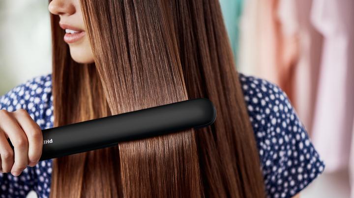 Produktbild Philips EssentialCare HP8321-00 / Haarglätter / 210 °C / schwarz (Glätteisen)