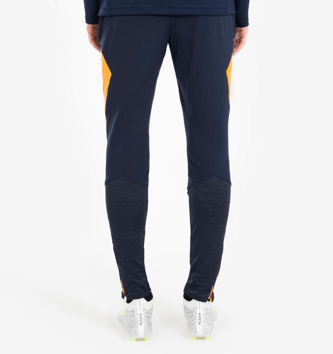 Produktbild Kipsta Damen/Herren Fussball Trainingshose - CLR orange/marineblau (W30/L33)