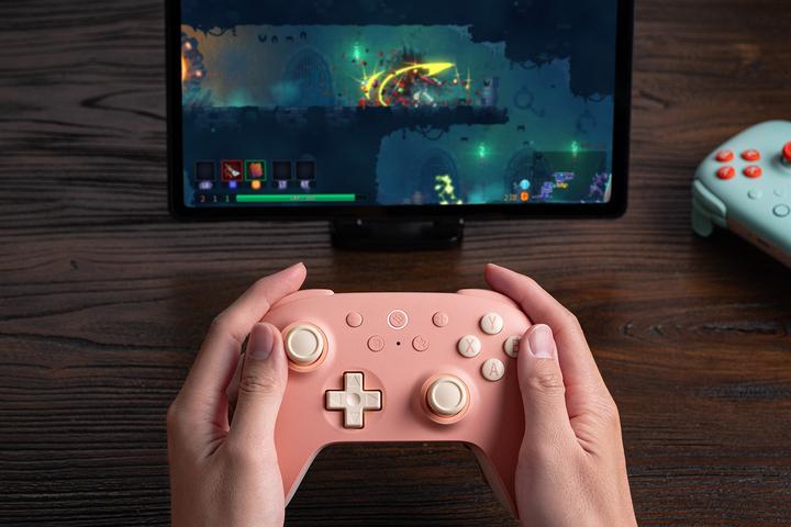 Actual product image 8bitdo Ultimate 2C Wireless (peach/light yellow, for Windows & Android) (Android, Windows)