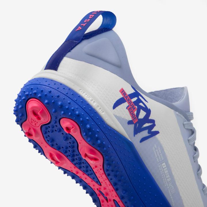 Immagine prodotto Kipsta Scarpe da calcio multi-punta da donna/uomo TF - Traxium Edge Turf bianco/blu (45)