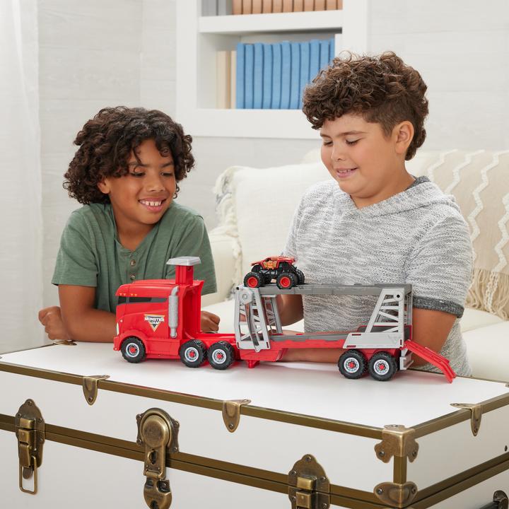 Actual product image Spin Master Monster Jam, Official 2-in-1 Launch N' Go Hauler playset with storage space, includes Monster Truck