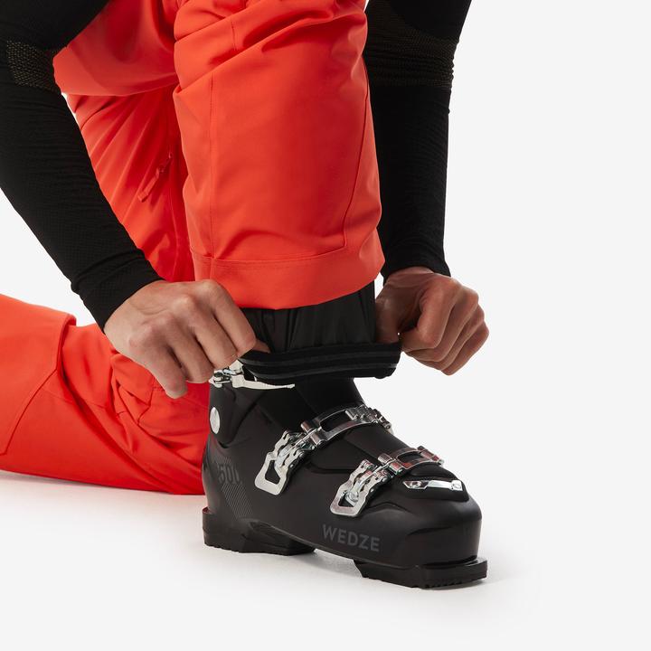 Immagine prodotto Wedze Pantaloni da sci da uomo caldi e regolabili - 500 arancione (XXL)