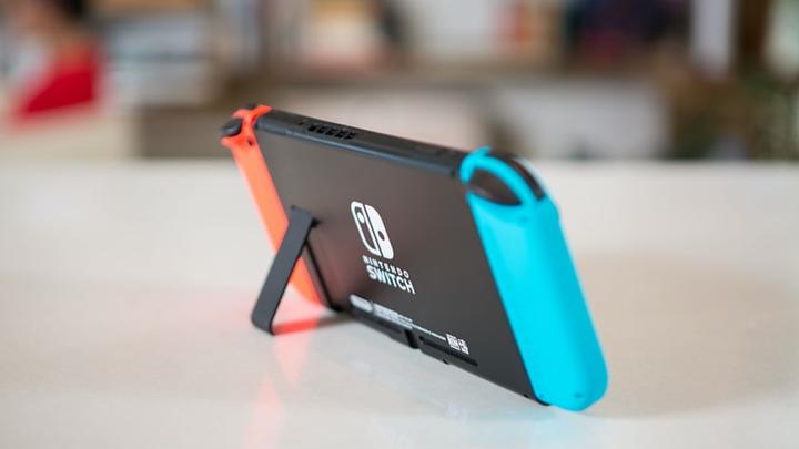 Actual product image Nintendo Switch Console - Neon Red/Neon Blue (UK) (Switch)