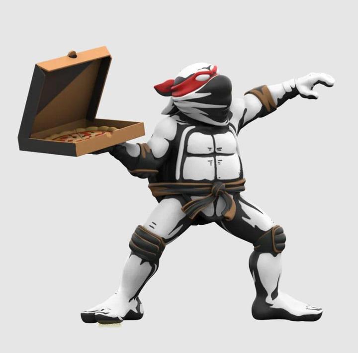 Produktbild Mighty Jaxx Teenage Mutant Ninja Turtles Pizza Bomber Collectible Figurine | by artist Ndikol Vinyl