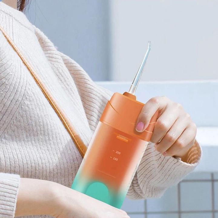 Produktbild OEM Consumer electronics Electric oral irrigator 200 ml 4 tips RC-K-563 orange