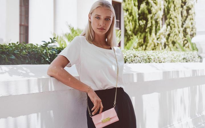 Produktbild iDeal Of Sweden Kensington Clutch (Apple iPhone 7, Apple iPhone SE, Apple iPhone 6, Apple iPhone 6s, Apple iPhone 8)