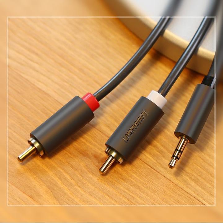 Image du produit Ugreen AV102 2x RCA jack 3.5 mm 1.5m (noir) (1.50 m, Câble AUX, Câbles Cinch)