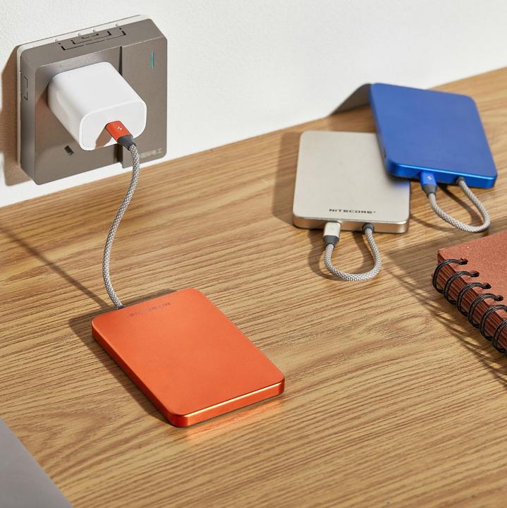 Actual product image Nitecore POCKET 5 Magnetic Ultra Thin Power Bank Alloy Orange (5000 mAh, 22.50 W)