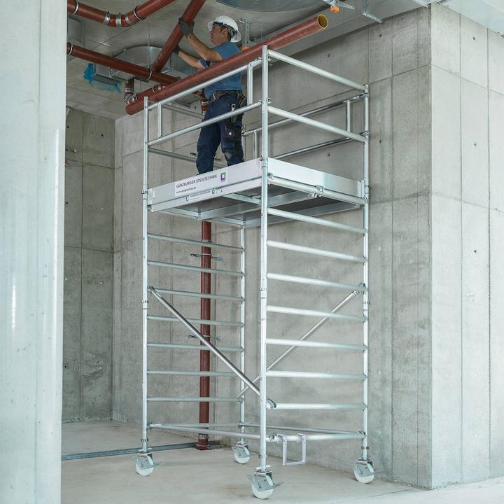 Produktbild Munk Rollgerüst 1,35 x 1,80 m mit Fahrbalken & Doppel-Plattform Plattformhöhe 5,45 m (Gerüst, 180 cm)