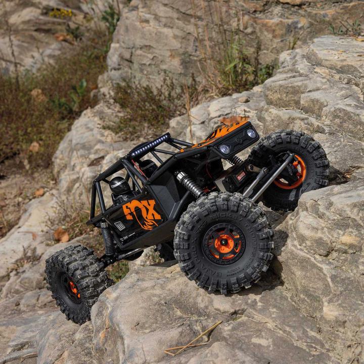 Image du produit Axial UTB10 Capra 1.9 1/10 4WS 4X4 RTR Brushed Rock Crawler, orange (RTR Prêt à fonctionner)