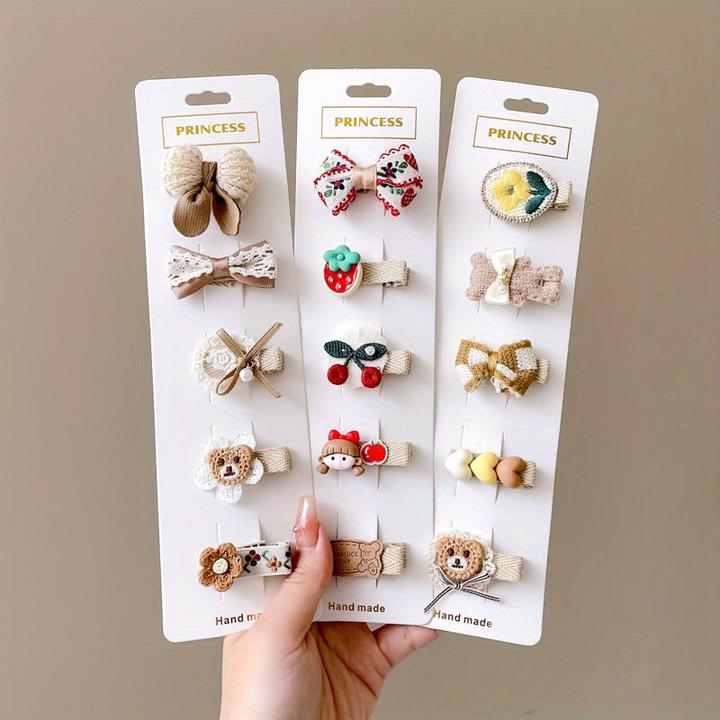 Image du produit Activity Board 15/20pcs pinces à cheveux en forme d'animaux de dessins animés avec un visage souriant et un noeud (20 pcs)