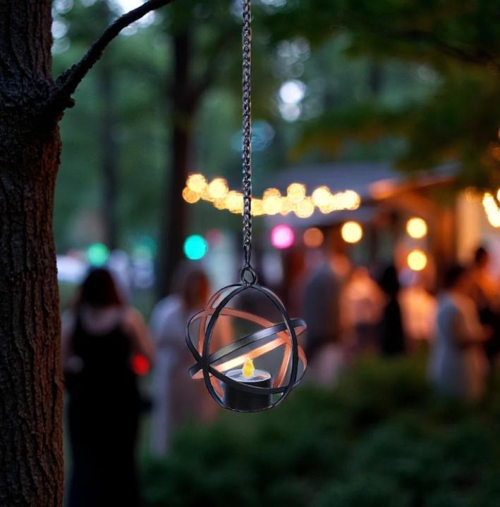 Actual product image GuGus LED solar pendant light with tea light, Ø 10 cm, black (60 lm)