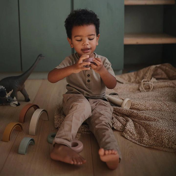 Actual product image Mushie Rainbow Tropical stacking game