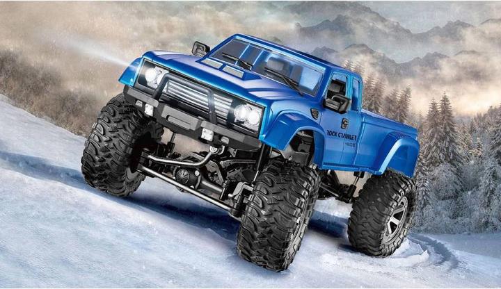 Image du produit Amewi Camionnette RC AMX RTR bleu avec roues et chaînes 4WD (RTR Prêt à fonctionner)