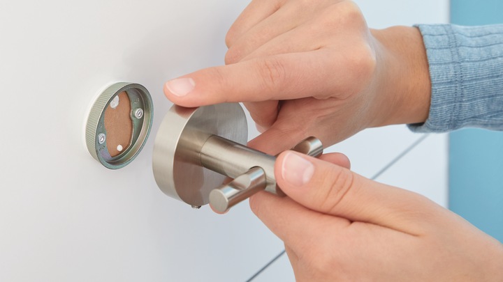 Actual product image tesa MOON hairdryer holder incl. adhesive solution without drilling