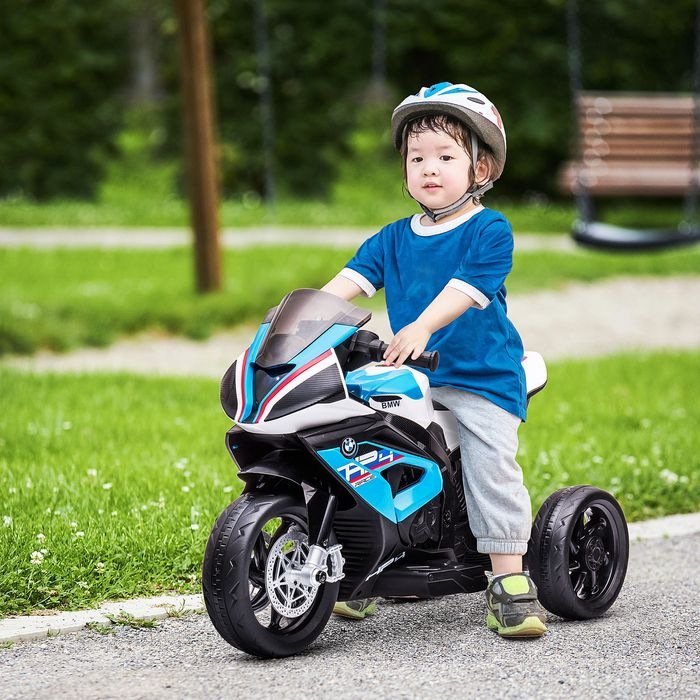 Immagine prodotto Swisshandel24 Triciclo elettrico per bambini 6V con 3 modalità musicali 2,5 km/h a partire da 18 mesi (6 V)