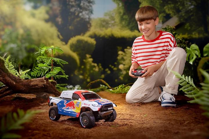 Image du produit Nikko 10561 Pro Truck Toyota Gazoo Dakar, voiture télécommandée RC, design Red Bull, véhicule tout-terrain