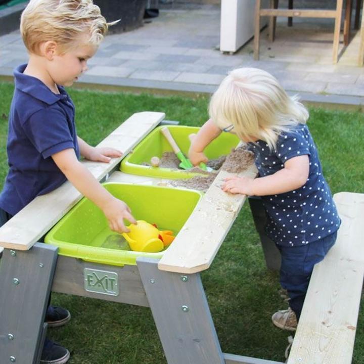 Image du produit Exit Aksent : sable, eau et table de pique-nique