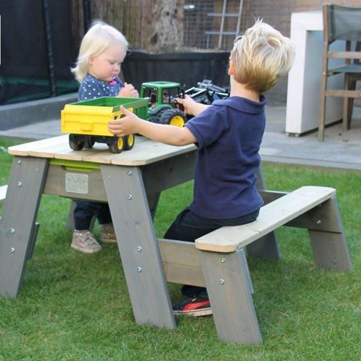 Image du produit Exit Aksent : sable, eau et table de pique-nique