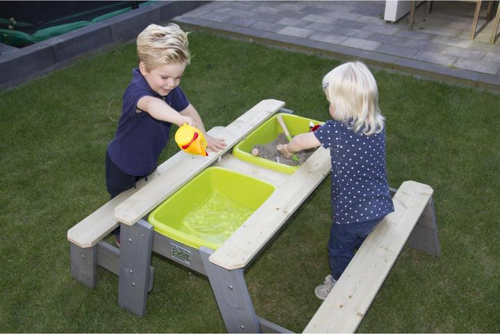 Image du produit Exit Aksent : sable, eau et table de pique-nique