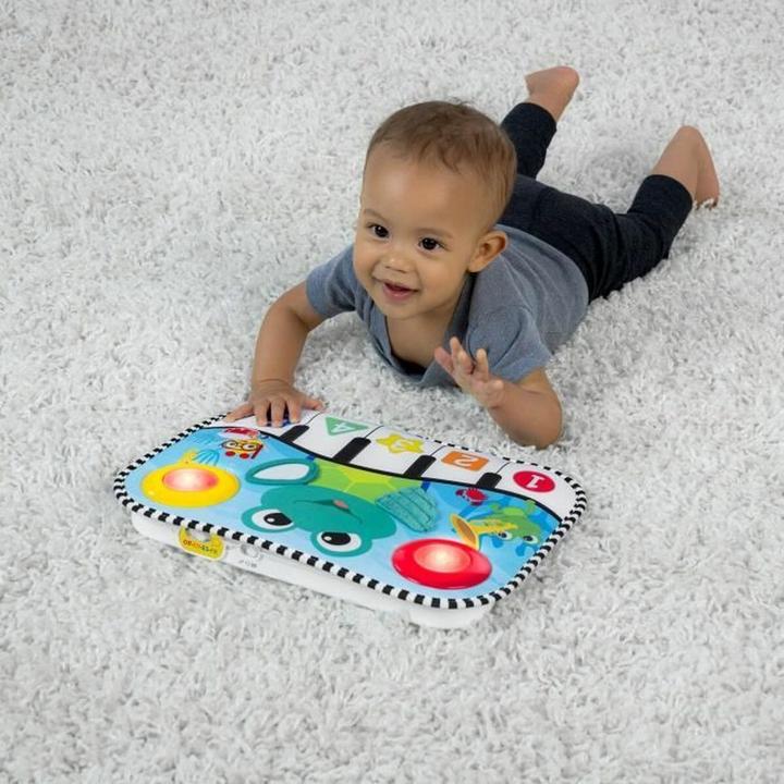 Immagine prodotto Baby Einstein Cuscino musicale e giocattolo da culla, Neptune's Kick & Explore™. (Inglese, Francese, Spagnolo)