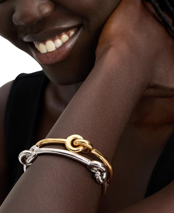 Actual product image Kate Spade Interlock Bangle (Brass)