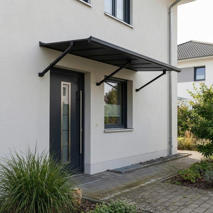 Actual product image Palram Canopia | Augustine 7.3ft Door Awning Black Structure / Opaque Grey Panels