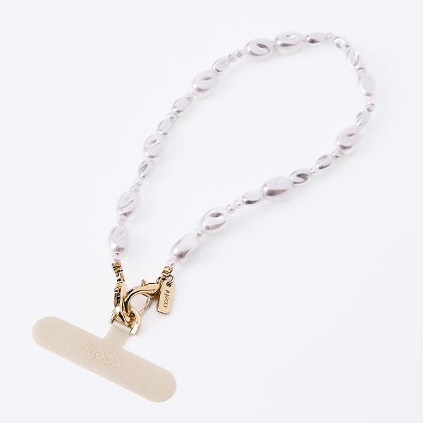 Actual product image Uniq Coehl Perla Handstrap uniwersalny sznurek do telefonu na rękę biały/white pearl