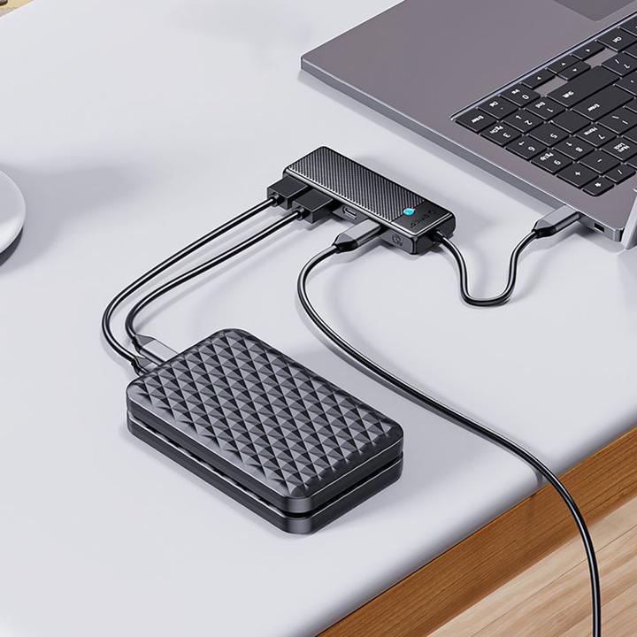 Actual product image Orico Converter Hub USB-C PAPW2AC-C3 docking station 2x USB-A 3.0 + 2x USB-C 3.0 - black (USB-C, 4 ports)