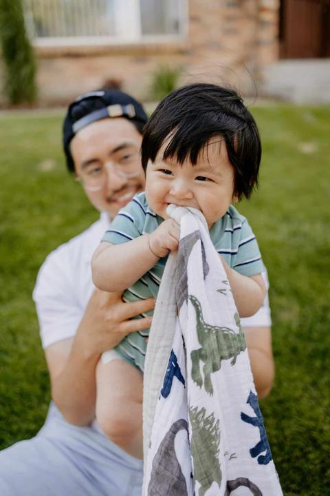 Actual product image little unicorn Cotton Muslin Baby Blanket - Dino Friends (120 x 120 cm)