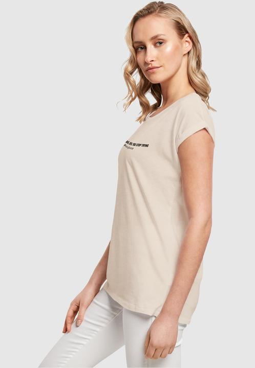 Actual product image Merchcode Ladies Never Give Up Extended Shoulder Tee - 111677 (S)