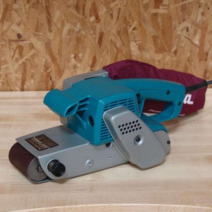 Produktbild Makita Tragbares Schleifgerät Bandschleifmaschine (Bandschleifer, 850 W)