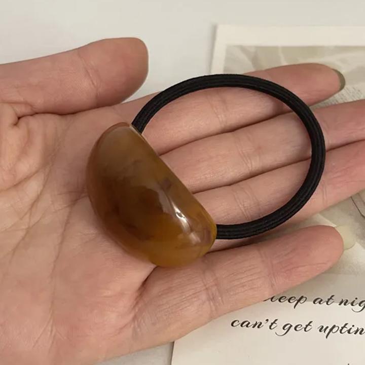 Immagine prodotto Avizar Haargummi mit Holz-Effekt-Perle (Elastico per capelli)