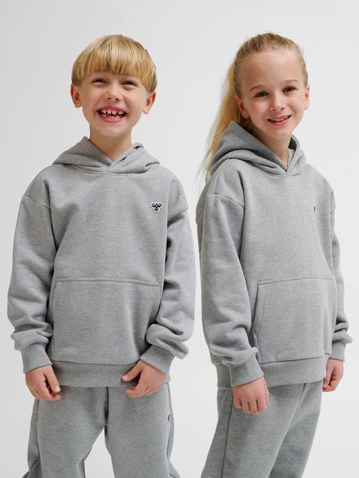 Produktbild hummel hmlJR LOOSE HOODIE BEE (46, 48, 50, 52)
