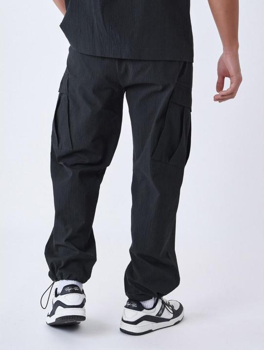 Actual product image Project X Paris Wrinkled effect trousers with pockets (L)